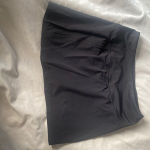Black golf/tennis skirt, size small.